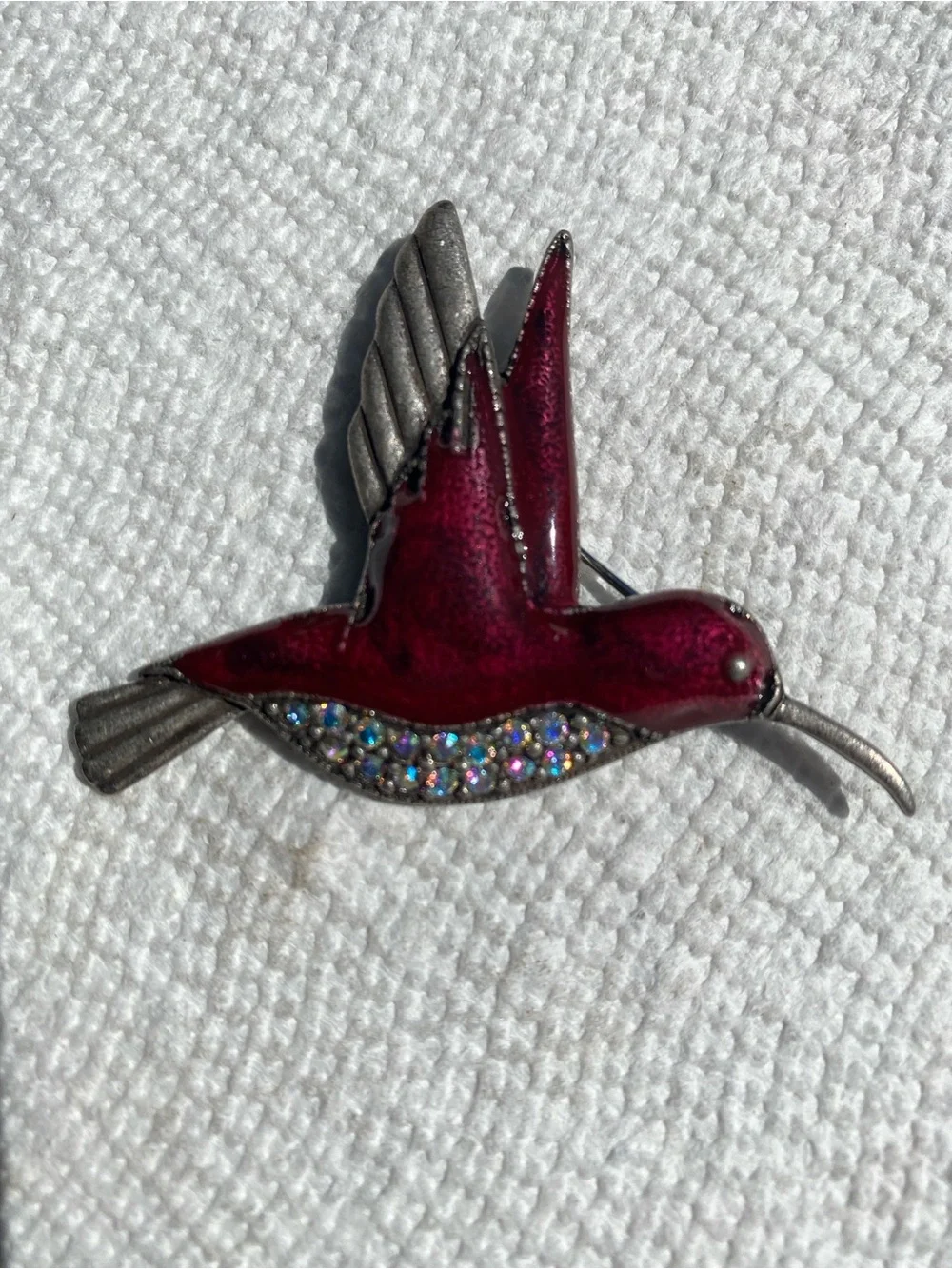 Vintage burgundy enamel, hummingbird. AB Rhinestone Silvertone pin.